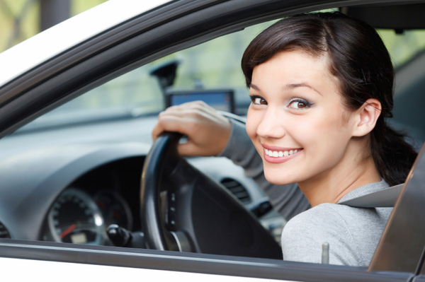 happy-young-girl-in-car_mam3k8